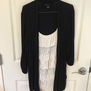 Black and cream colored blouse